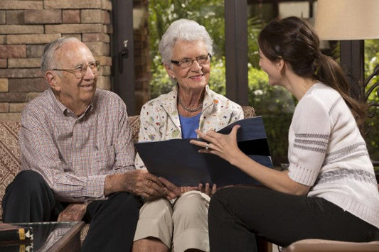 Senior living advisor consulting with a family